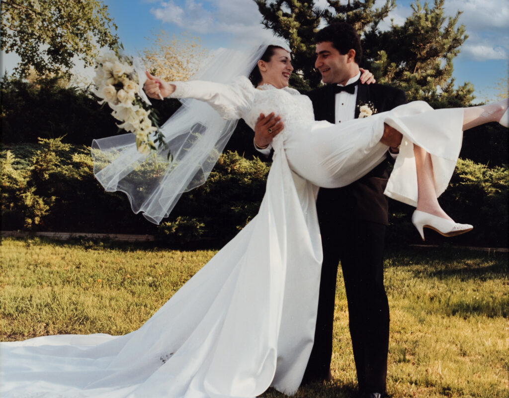 Groom Lifting the bride with joy